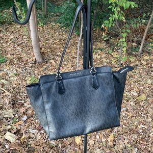 Michael Kors black tote bag.